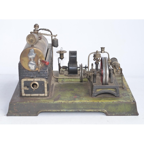 1166 - DC Doll & Cie of Nuremberg tinplate stationary horizontal steam engine scale layout with 2 volt gene... 