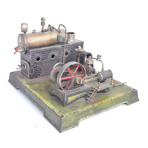 1166 - DC Doll & Cie of Nuremberg tinplate stationary horizontal steam engine scale layout with 2 volt gene... 