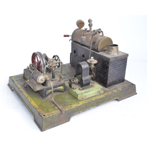 1166 - DC Doll & Cie of Nuremberg tinplate stationary horizontal steam engine scale layout with 2 volt gene... 