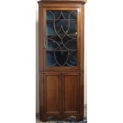 138 - George 111 boxwood strung mahogany standing corner cabinet, gadrooned cornice and scrolled astragal ... 