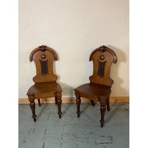 863 - Pair of Victorian oak hall chairs, solid seats and backs on spiral turned supports, H96cm (2)