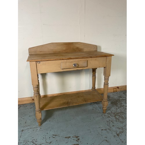 870 - Victorian stripped pine washstand with raised back and drawer on turned supports joined by stretcher... 