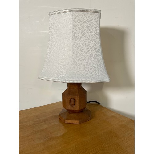 985 - Alan Acornman Grainger, Acorn Industries Brandsby - an oak  octagonal baluster table lamp, carved wi... 