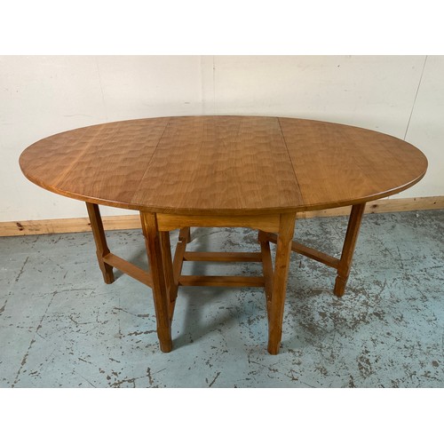 992 - Alan Acornman Grainger, Acorn Industries Brandsby - an oak gateleg dining table, oval top with two f... 