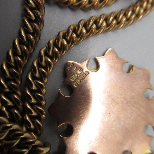 15 - 9ct yellow and rose gold fob, stamped 375, on yellow metal chain, and a yellow metal ring with worn ... 