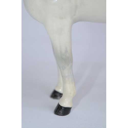 192 - Three Beswick ceramic horse figurines, 2 in gloss finish, 1 matt, larger gloss example with repaired... 