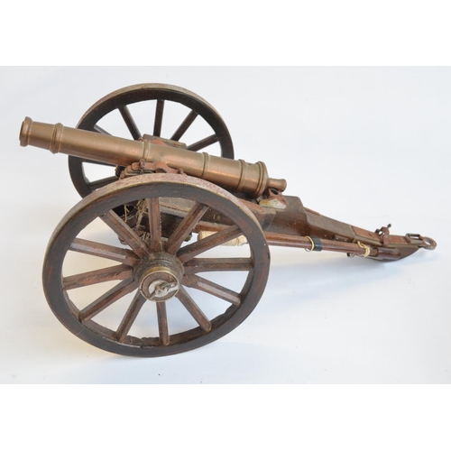 228 - Attractive large scale model cannon with 3 munitions carts. Cannon itself in brass, overall length o... 