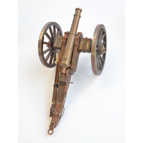 228 - Attractive large scale model cannon with 3 munitions carts. Cannon itself in brass, overall length o... 