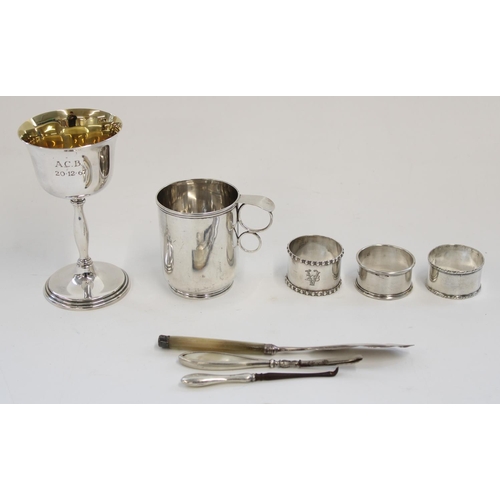 1328 - Hallmarked silver presentation goblet with gilt interior in original box, small silver cup, three si... 