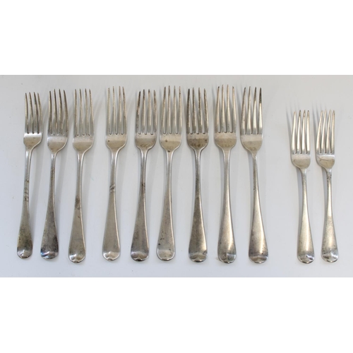 1331 - Nine Geo. III hallmarked silver dinner forks, various dates and makers, together with two Victorian ... 