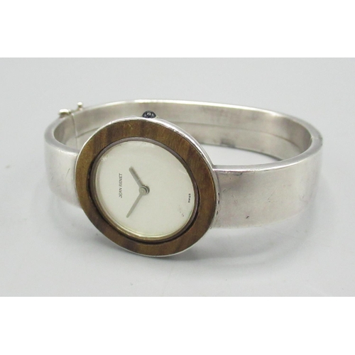 1336 - Jean Renet ladies silver wristwatch, inset hardwood bezel on integral hinged bracelet hallmarked .92... 