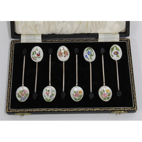 431 - Cased set of six hallmarked silver coffee spoons, the bowls decorated in enamel spring flowers, Henr... 