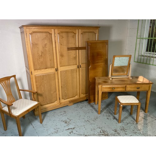 995 - Knightman Family, Old Mill Furniture of Balk - an oak bedroom suite comprising; three door wardrobe,... 