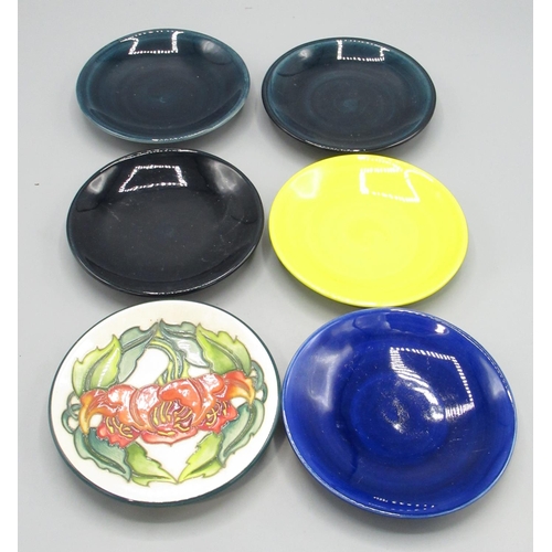 696 - Moorcroft Pottery: six trial pin dishes/coasters - five flat colour/glaze trials, and a design of or... 