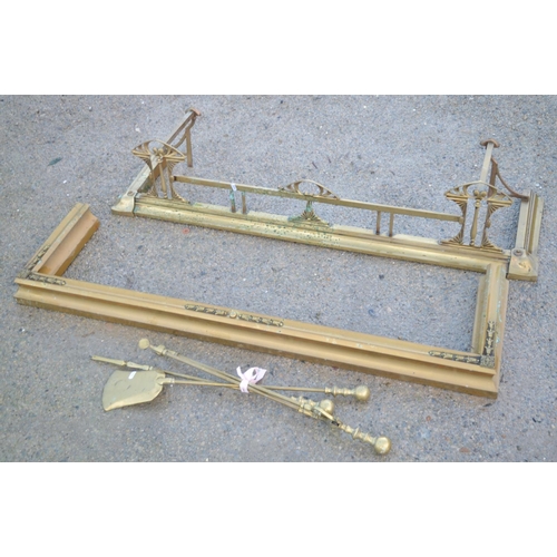 1363 - 20th art nouveau style brass fire curb, W137cm, another brass fire curb and 3 brass fire irons