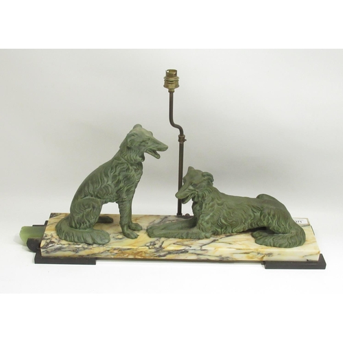 371 - Art Deco style slate and variegated marble table lamp mounted with two patinated spelter dogs, W71cm... 