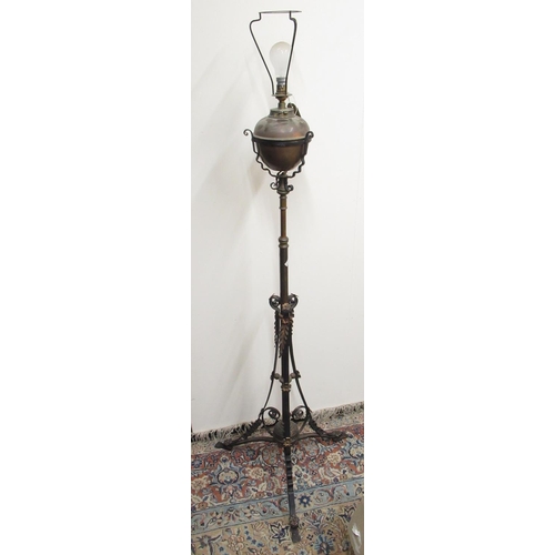 373 - Late C19th wrought iron and brass rise and fall oil lamp (converted to electric) and wrought iron li... 