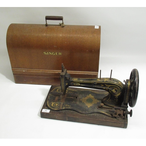 377 - Singer hand sewing machine in oak case (key a.f.) and a Jones treadle sewing machine (2)