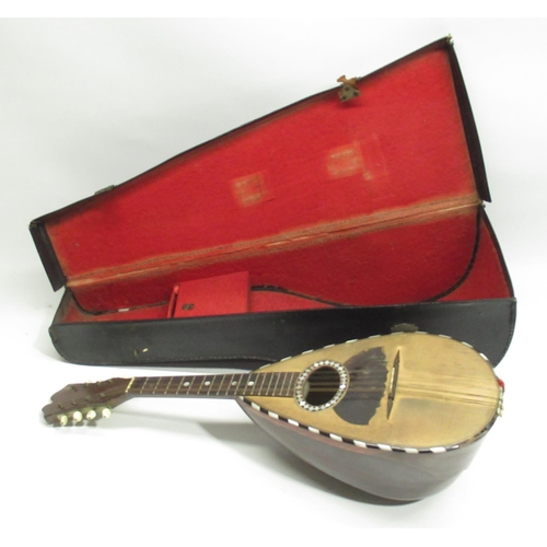 378 - C20th Italian rosewood mandolin with ebony and Mother of Pearl inlay, bearing makes label L61cm