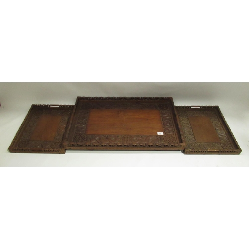 380 - Jubbar Khan & Son, 3rd Bridge, Srinagar, Kashmir - C20th carved hardwood gallery tray, W75.5cm, and ... 