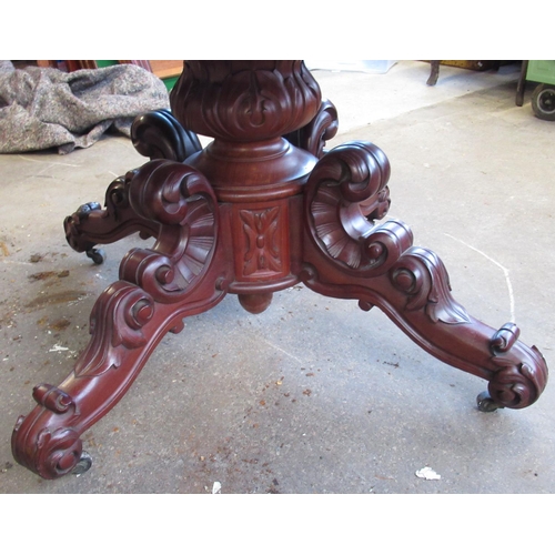 864 - Victorian figured mahogany extending dining table, circular pull action top with fold down legs on c... 