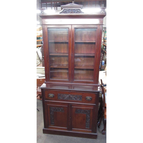 868 - Edwardian mahogany secretaire bookcase, carved cornice above two glazed doors a fitted fall front se... 