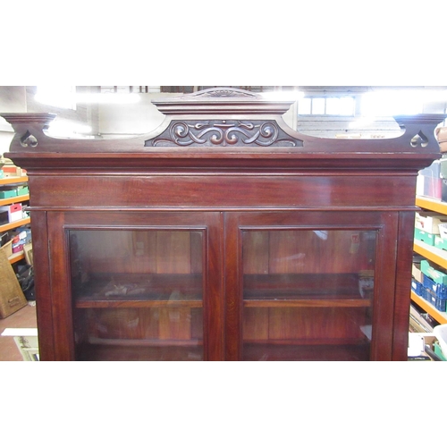 868 - Edwardian mahogany secretaire bookcase, carved cornice above two glazed doors a fitted fall front se... 