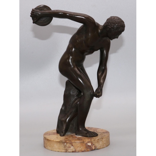 1143 - After the Antique; 'Discobolus' the Discus thrower, patinated bronze, on circular marble base, H22cm