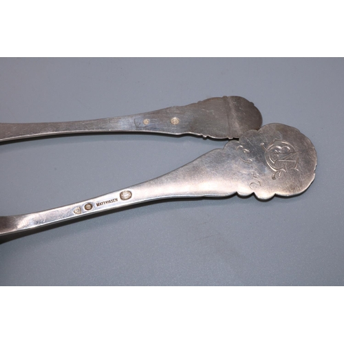 1088 - C20th Danish Silver serving spoon, with stylized fruit and planished handle and bowl, stamped Matthi... 