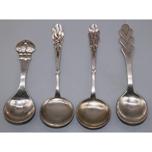 1097 - Pair of small C20th Danish silver serving spoons with stylized handles and circular bowls, stamped H... 