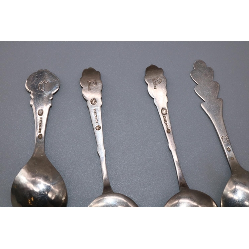 1097 - Pair of small C20th Danish silver serving spoons with stylized handles and circular bowls, stamped H... 