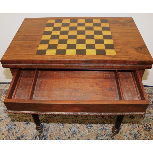 1405 - C19th Gillows style rosewood games table, swivel folding boxwood and ebonised baize lined chessboard... 