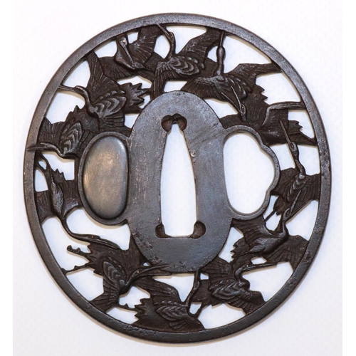 1200 - Japanese Mumia 17th century tsuba to fit wakazashi, with pieaced boarder of cranes in flight with go... 