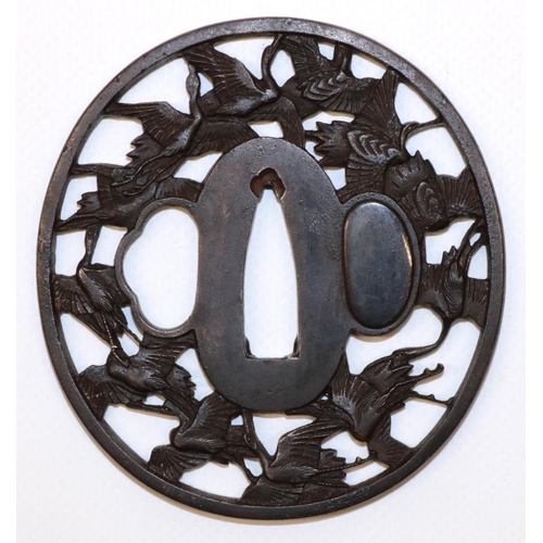 1200 - Japanese Mumia 17th century tsuba to fit wakazashi, with pieaced boarder of cranes in flight with go... 