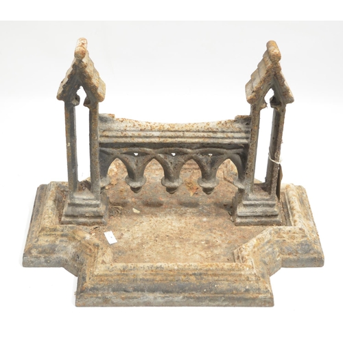 1494 - Large Victorian cast iron boot scraper, with arcade frieze and pierced tower supports, on stepped el... 