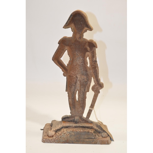 1496 - Victorian iron door stop, cast as Nelson on stepped plinth with bun feet and rectangular base, H37cm