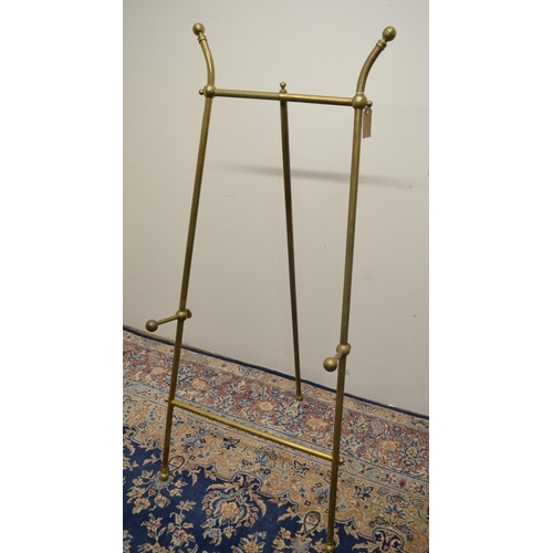 1151 - Arts and Crafts design brass picture easel, tubular frame with adjustable height and reeded ball fin... 