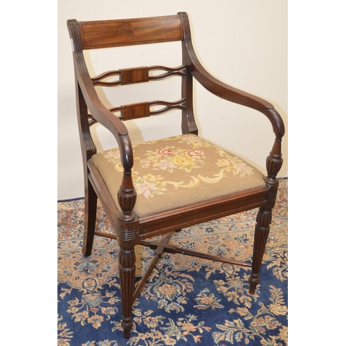 1440 - Regency mahogany elbow chair, with curved cresting rail, two pierced splats and drop-in woolwork sea... 