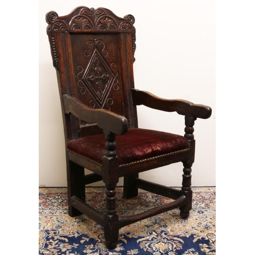 1400 - C17th oak wainscot arm chair, scroll and lozenge carved panel back with floral lunette carved serpen... 