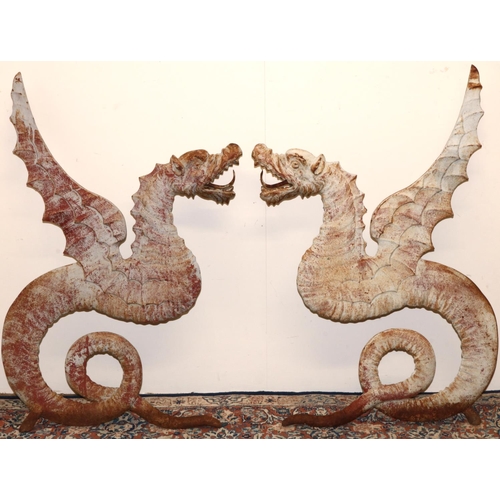 1490 - Pair of cast metal Dragon bench seat ends, with wing back supports and open mouth arm rests  on curl... 