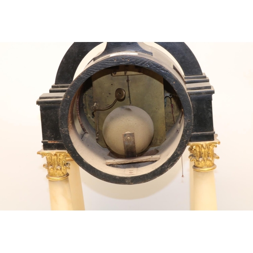 1269 - C19th French ebonised and alabaster portico clock, gilt eagle pediment over drum head supported by f... 