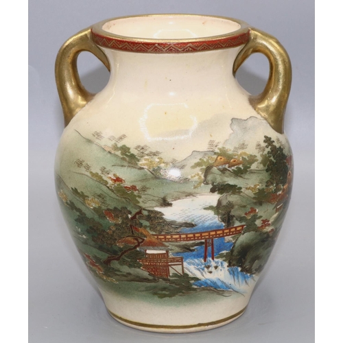 1116 - Early 20th century Japanese Satsuma twin handled vase, decorated a landscape, signed in panel on bas... 