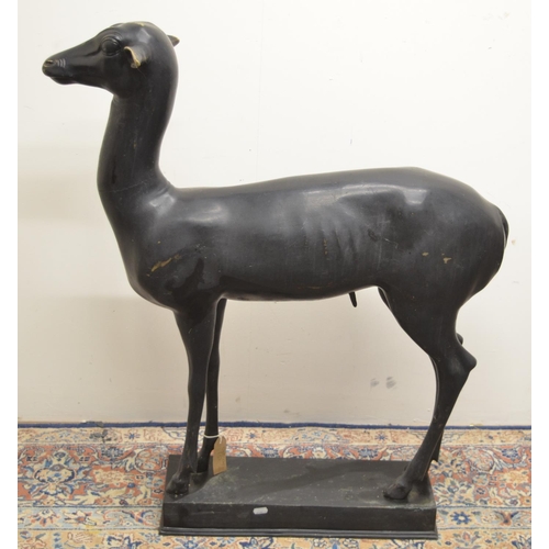 1132 - Large patinated bronze model of a standing male deer, on rectangular base, W78cm H91cm