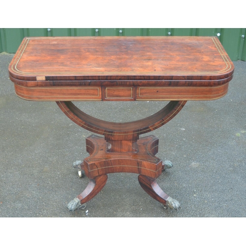 1427 - Regency brass strung rosewood card table, swivel folding baize lined top on open curved support and ... 