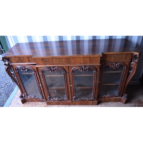 1413 - Victorian rosewood break front side cabinet, with frieze drawer above four scroll moulded glazed doo... 