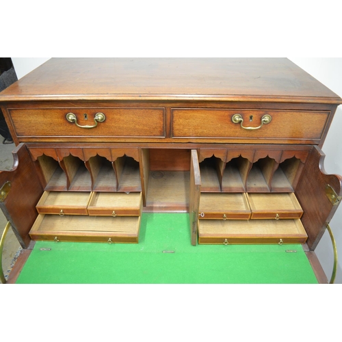 1410 - George 111 mahogany secretaire chest, moulded top above two short drawers and fall front writing sur... 