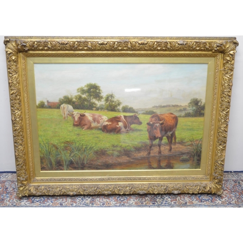 1343 - Joseph Dixon Clark (British 1849-1944): Cattle in a riverside meadow, oil on canvas signed 60cm x 90... 