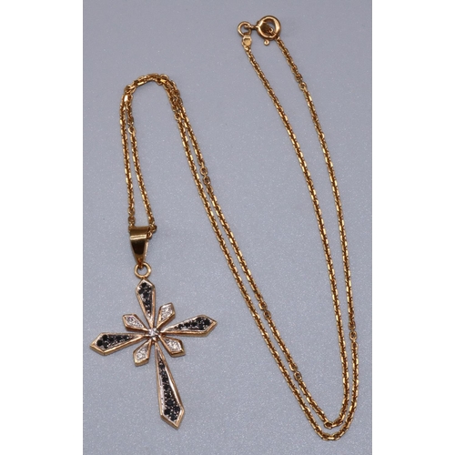 1037 - yellow metal cross pendant set with brilliant cut diamonds and sapphires, on 18ct yellow gold chain,... 