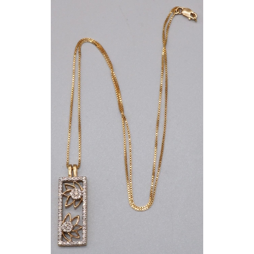 1035 - Yellow metal floral panel pendant set with brilliant cut diamonds, on 18ct yellow gold chain, stampe... 