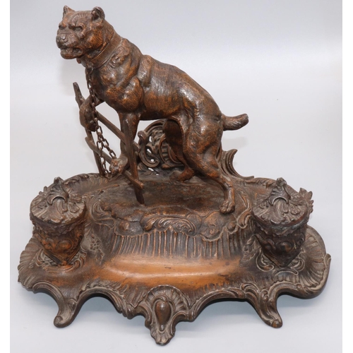 1140 - After A. Bossu (French C20th); Patinated spelter inkstand, with two urn shaped wells and a mastiff c... 